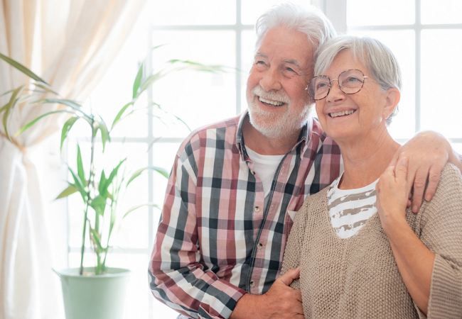 happy senior couple at home