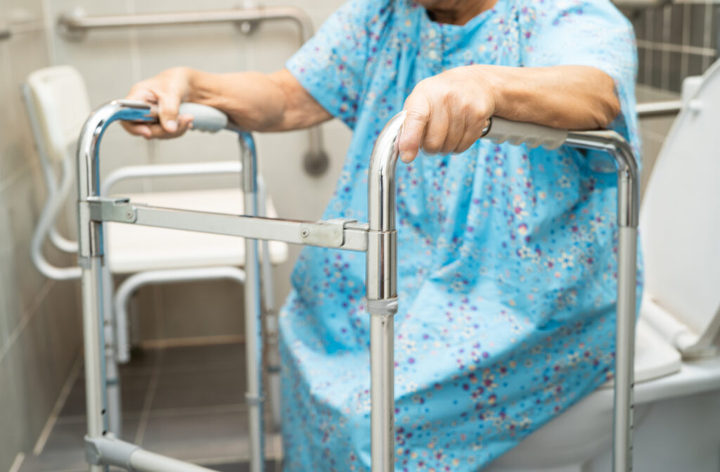 Senior woman in a bathroom setting, illustrating the everyday context of toilet transfer safety planning for seniors